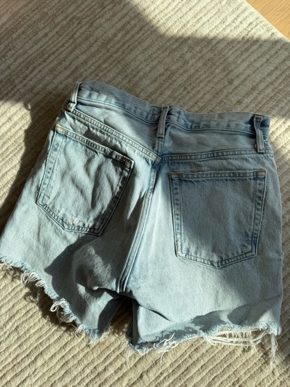 Agolde Riley Distressed High-Rise Light Blue Denim Shorts - Picture 5 of 5